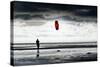 Germany, Schleswig-Holstein, Amrum, Sandy Beach, Sandbank, Kniepsand, Person Flying Kite-Ingo Boelter-Stretched Canvas