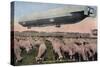 Germany - View of a Zeppelin Blimp over Grazing Sheep-Lantern Press-Stretched Canvas