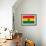 Ghana Flag Design with Wood Patterning - Flags of the World Series-Philippe Hugonnard-Framed Art Print displayed on a wall