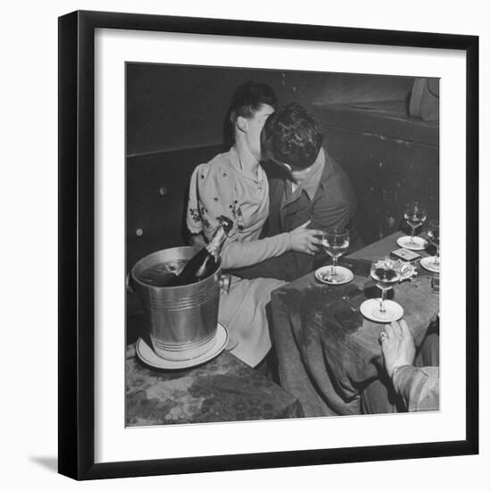 GI Kissing His Lady Friend After a Glass of Champagne-Ed Clark-Framed Photographic Print