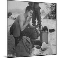 GI shaving with mirror during ull in the Ardennes Forest Conflict called the Battle of the Bulge-John Florea-Mounted Photographic Print