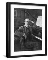 Giacomo Puccini Leans on the Pianoa Cigarette Dangling from the Side of His Mouth-G^ Magrini-Framed Premium Photographic Print