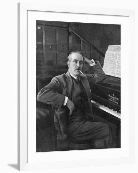 Giacomo Puccini Leans on the Pianoa Cigarette Dangling from the Side of His Mouth-G^ Magrini-Framed Photographic Print