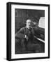 Giacomo Puccini Leans on the Pianoa Cigarette Dangling from the Side of His Mouth-G^ Magrini-Framed Photographic Print