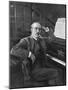 Giacomo Puccini Leans on the Pianoa Cigarette Dangling from the Side of His Mouth-G^ Magrini-Mounted Photographic Print