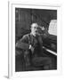 Giacomo Puccini Leans on the Pianoa Cigarette Dangling from the Side of His Mouth-G^ Magrini-Framed Photographic Print