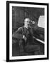 Giacomo Puccini Leans on the Pianoa Cigarette Dangling from the Side of His Mouth-G^ Magrini-Framed Photographic Print