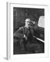 Giacomo Puccini Leans on the Pianoa Cigarette Dangling from the Side of His Mouth-G^ Magrini-Framed Photographic Print