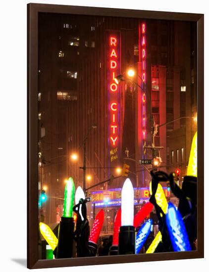 Giant Christmas wreath in front of the Radio City Music Hall on a Winter Night-Philippe Hugonnard-Framed Photographic Print