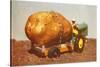 Giant Potato on Toy Tractor-null-Stretched Canvas