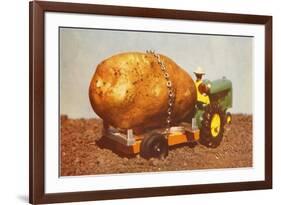 Giant Potato on Toy Tractor-null-Framed Art Print