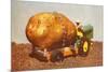 Giant Potato on Toy Tractor-null-Mounted Premium Giclee Print