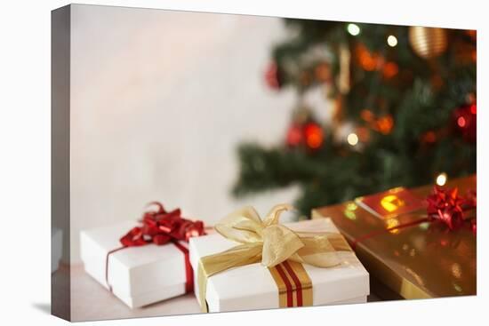 Gifts under a Christmas Tree-Klaus Tiedge-Stretched Canvas