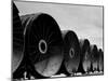 Gigantic Pipe Segments Used for Diverting the Missouri River During Construction of Fort Peck Dam-Margaret Bourke-White-Mounted Photographic Print