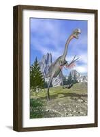 Gigantoraptor Dinosaur Running in the Mountains-null-Framed Art Print