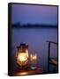 Gin and Tonic by the Light of Hurricane Lamp, Looking Out over the Zambezi River, Zambia-John Warburton-lee-Framed Stretched Canvas