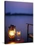 Gin and Tonic by the Light of Hurricane Lamp, Looking Out over the Zambezi River, Zambia-John Warburton-lee-Stretched Canvas