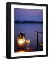 Gin and Tonic by the Light of Hurricane Lamp, Looking Out over the Zambezi River, Zambia-John Warburton-lee-Framed Photographic Print