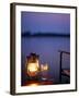 Gin and Tonic by the Light of Hurricane Lamp, Looking Out over the Zambezi River, Zambia-John Warburton-lee-Framed Photographic Print