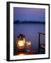 Gin and Tonic by the Light of Hurricane Lamp, Looking Out over the Zambezi River, Zambia-John Warburton-lee-Framed Photographic Print