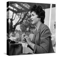 Gina Lollobrigida at the Table of a Bar-null-Stretched Canvas