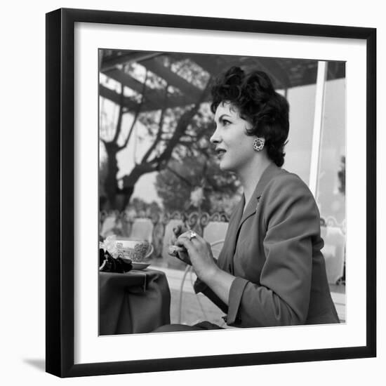 Gina Lollobrigida at the Table of a Bar-null-Framed Photographic Print