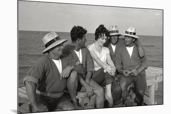 Gina Lollobrigida on the Seashore with Lifeguards-null-Mounted Photographic Print