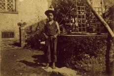 Child in Front of Well, Photograph Taken-Giovanni Pascoli-Framed Stretched Canvas