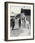 Giraffe with 3 Day Old Baby and Keeper at London Zoo, 1914-Frederick William Bond-Framed Photographic Print