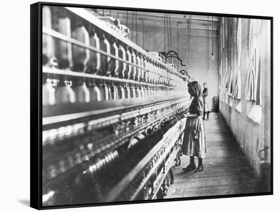 Girl at Spinning Machine-Lewis Wickes Hine-Framed Stretched Canvas