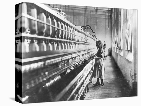 Girl at Spinning Machine-Lewis Wickes Hine-Stretched Canvas