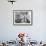 Girl at Spinning Machine-Lewis Wickes Hine-Framed Photographic Print displayed on a wall