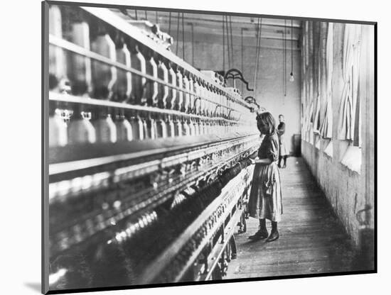 Girl at Spinning Machine-Lewis Wickes Hine-Mounted Photographic Print