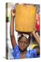 Girl carrying a heavy load, St. Louis, Senegal-Godong-Stretched Canvas