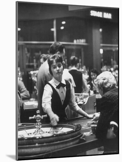 Girl Croupier at Harrah's Club-Nat Farbman-Mounted Photographic Print