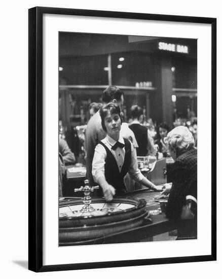 Girl Croupier at Harrah's Club-Nat Farbman-Framed Photographic Print