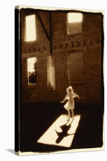 Girl dancing in a shaft of light-Theo Westenberger-Stretched Canvas