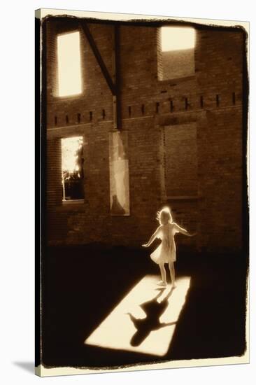 Girl dancing in a shaft of light-Theo Westenberger-Stretched Canvas