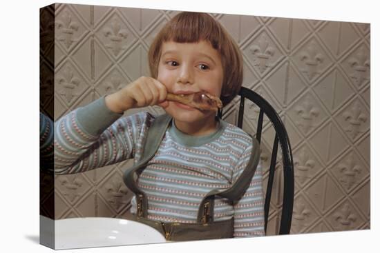 Girl Eating a Chicken Drumstick-William P. Gottlieb-Stretched Canvas