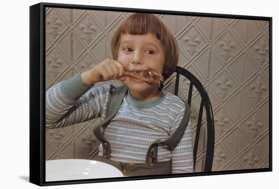 Girl Eating a Chicken Drumstick-William P. Gottlieb-Framed Stretched Canvas