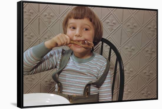 Girl Eating a Chicken Drumstick-William P. Gottlieb-Framed Stretched Canvas