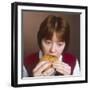 Girl Eating a Hamburger-null-Framed Photographic Print