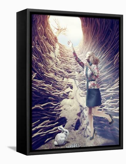 Girl Flies out of a Deep Hole toward the Sunlight. Creative Concept-viczast-Framed Stretched Canvas