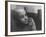 Girl Gazing Pensively Through Pane of Her Apartment Window, Grimly Reflects Image of Berlin Wall-Paul Schutzer-Framed Photographic Print