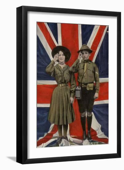 Girl Guide and Boy Scout Saluting in Front of the Union Flag-null-Framed Photographic Print