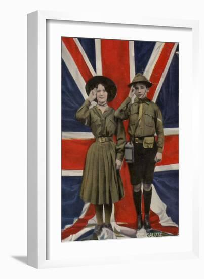 Girl Guide and Boy Scout Saluting in Front of the Union Flag-null-Framed Photographic Print