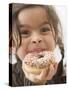 Girl Holding a Doughnut with Sprinkles, Partly Eaten-null-Stretched Canvas
