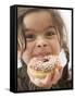 Girl Holding a Doughnut with Sprinkles, Partly Eaten-null-Framed Stretched Canvas