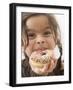 Girl Holding a Doughnut with Sprinkles, Partly Eaten-null-Framed Photographic Print