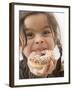 Girl Holding a Doughnut with Sprinkles, Partly Eaten-null-Framed Photographic Print